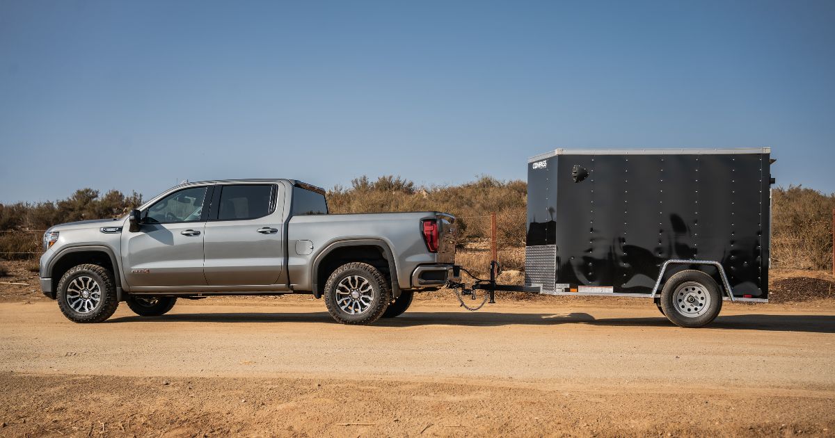 A used enclosed cargo trailer from California Trailers that a customer purchased for versatility, using our trailer buying tips. " width="1200" height="630