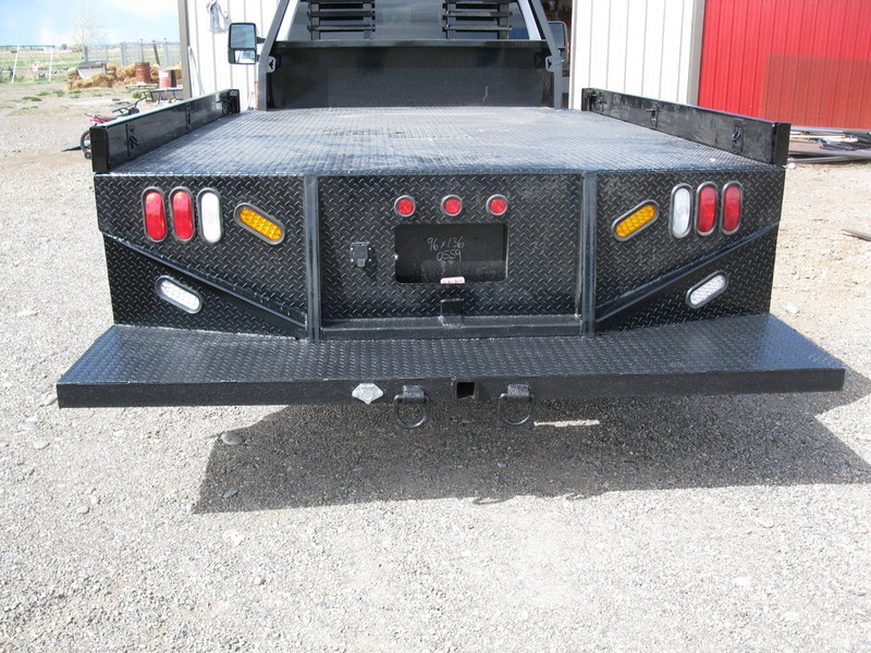 Custom Work to Flatbeds Ironman Ent Load Trail dump equipment and utility trailers and