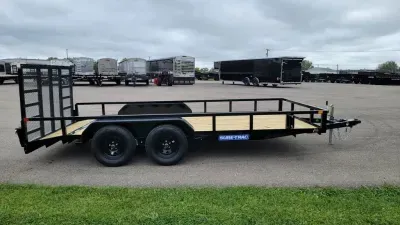 2027 Sure-Trac 7'X16' Tube Top Beavertail 7K Ladder Gate Utility Trailer 