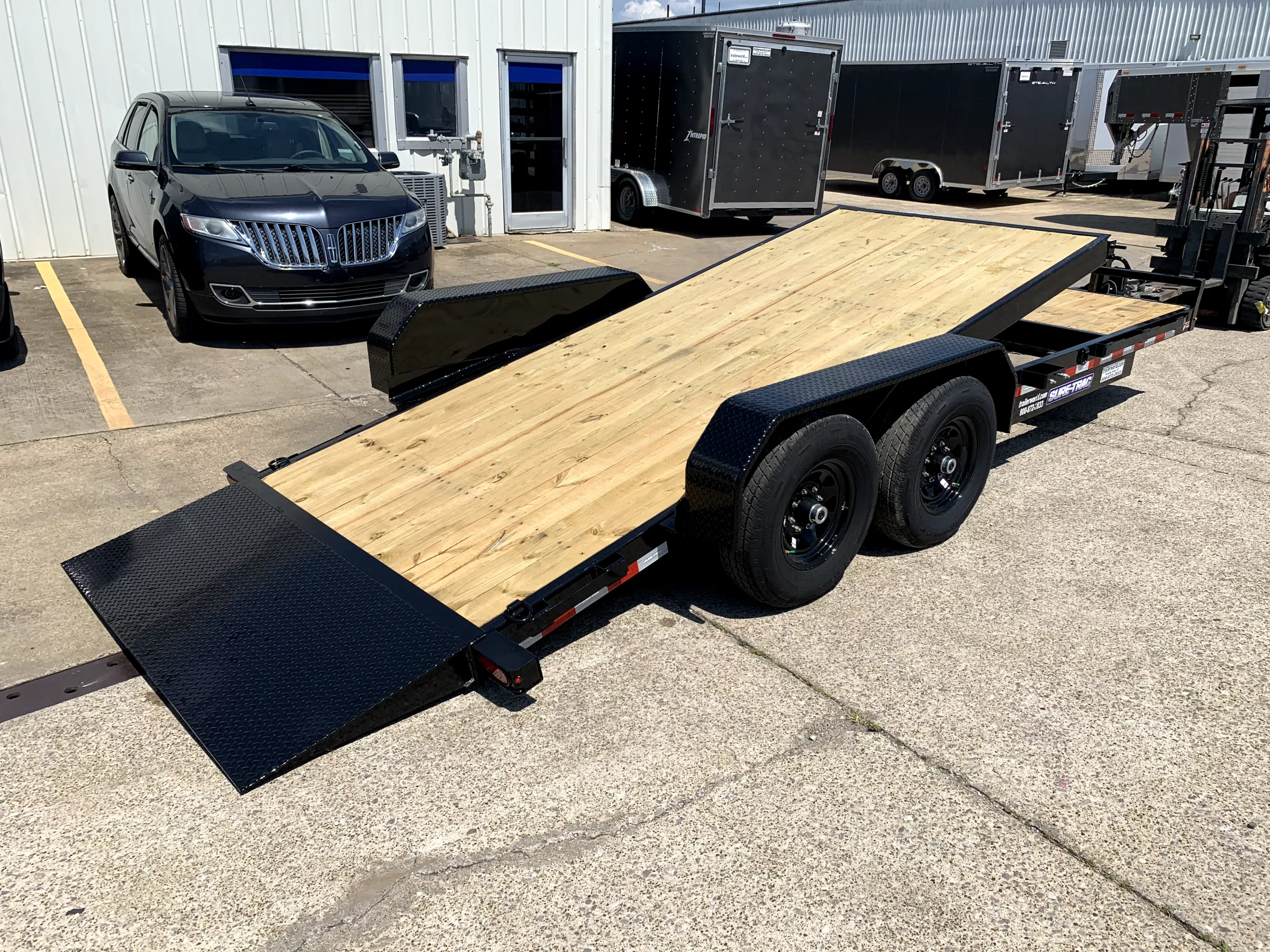 2026 Sure-Trac 7' x 20' (16+4) (2)7K Axles Tilt Bed Equipment Trailer FKIReKn0u17n