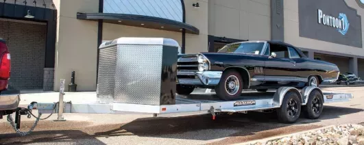 2026 Aluma 8220 Heavy XL Tilt Tandem Trailer with Electric Brakes, Recessed Tie Downs, and Cargo Box Black 82" x 20' Car Hauler