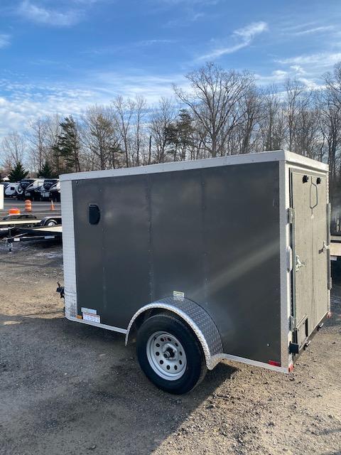 2021 Arising 5' x 8' Charcoal Enclosed Cargo Trailer w/ Spare Tire and Mount 2021 Arising 5' x 8' Charcoal Enclosed Cargo Trailer w/ Spare Tire and Mount