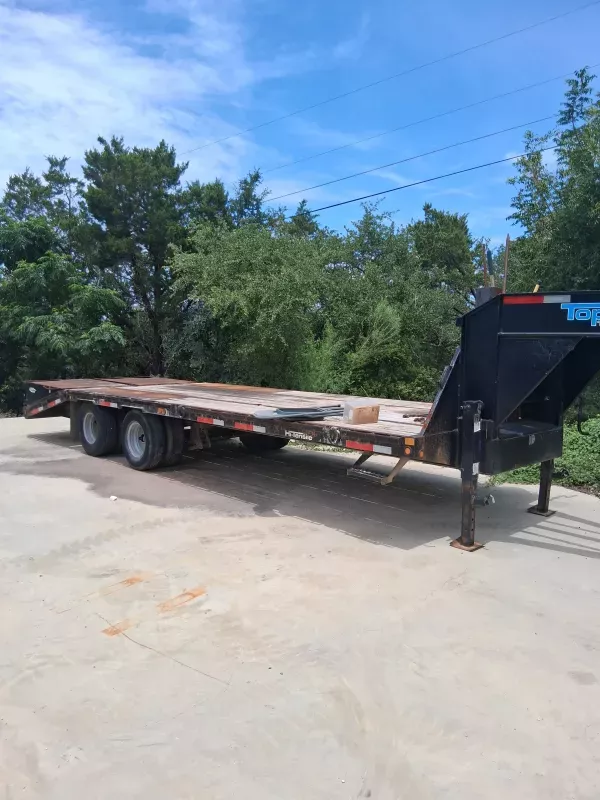 Equipment trailer with monster ramps and under mount tool boxes