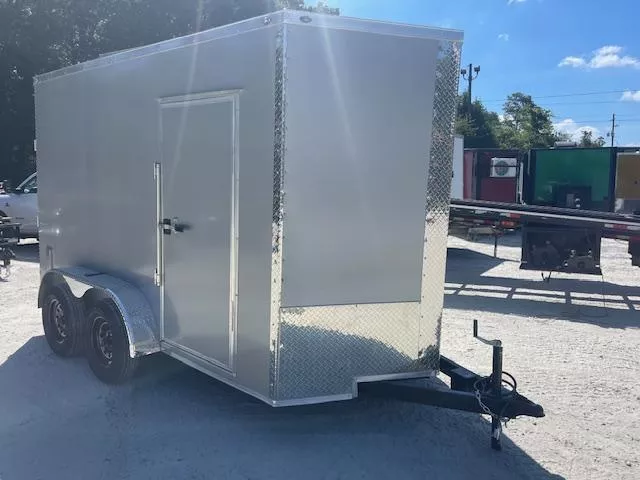 6x12 Enclosed Trailer 7 Foot Interior Height .080 Poly Skin One Piece Aluminum Roof 2 Way Side Vents, 4 D Rings W/ Side Door Barlock & Flushlock & Ramp 2025 
