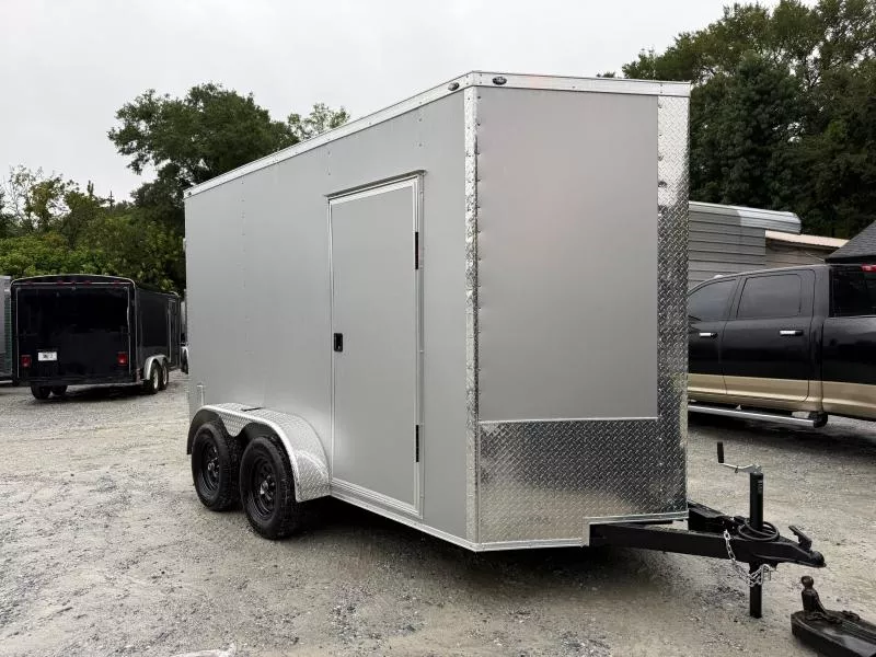 6x12 Enclosed Trailer 7 Foot Interior Height .080 Poly Skin One Piece Aluminum Roof 2 Way Side Vents, 4 D Rings W/ Side Door Barlock, Flushlock & Barn Door 2025