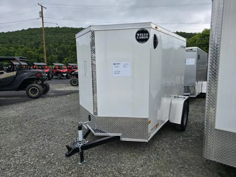 2025 Wells Cargo 5x8 3K Enclosed Trailer- Single Rear Swing Door- One Piece Aluminum Roof